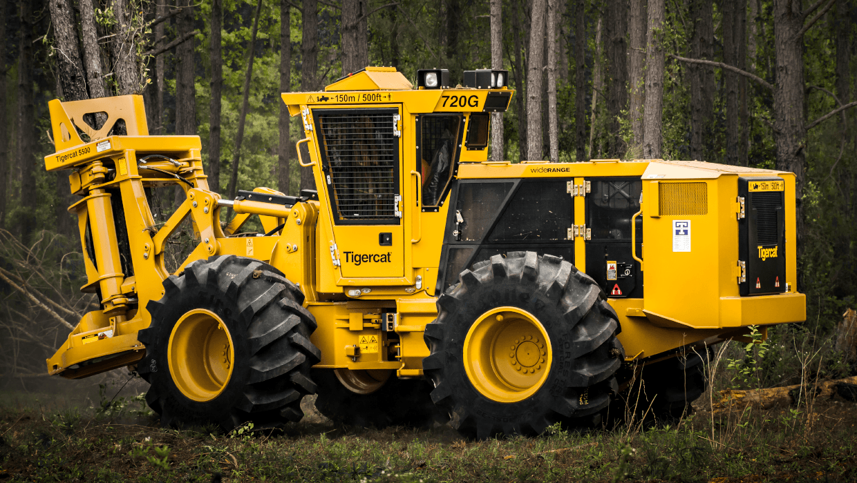 Image of a Mackolines Machines & Hire 720G wheel feller buncher working in the field