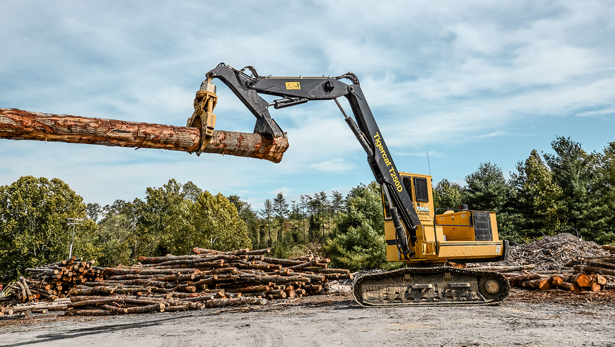 Image of a Mackolines Machines & Hire T250D loader working in the field