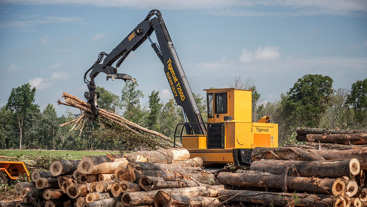 Image of a Mackolines Machines & Hire T250D loader working in the field