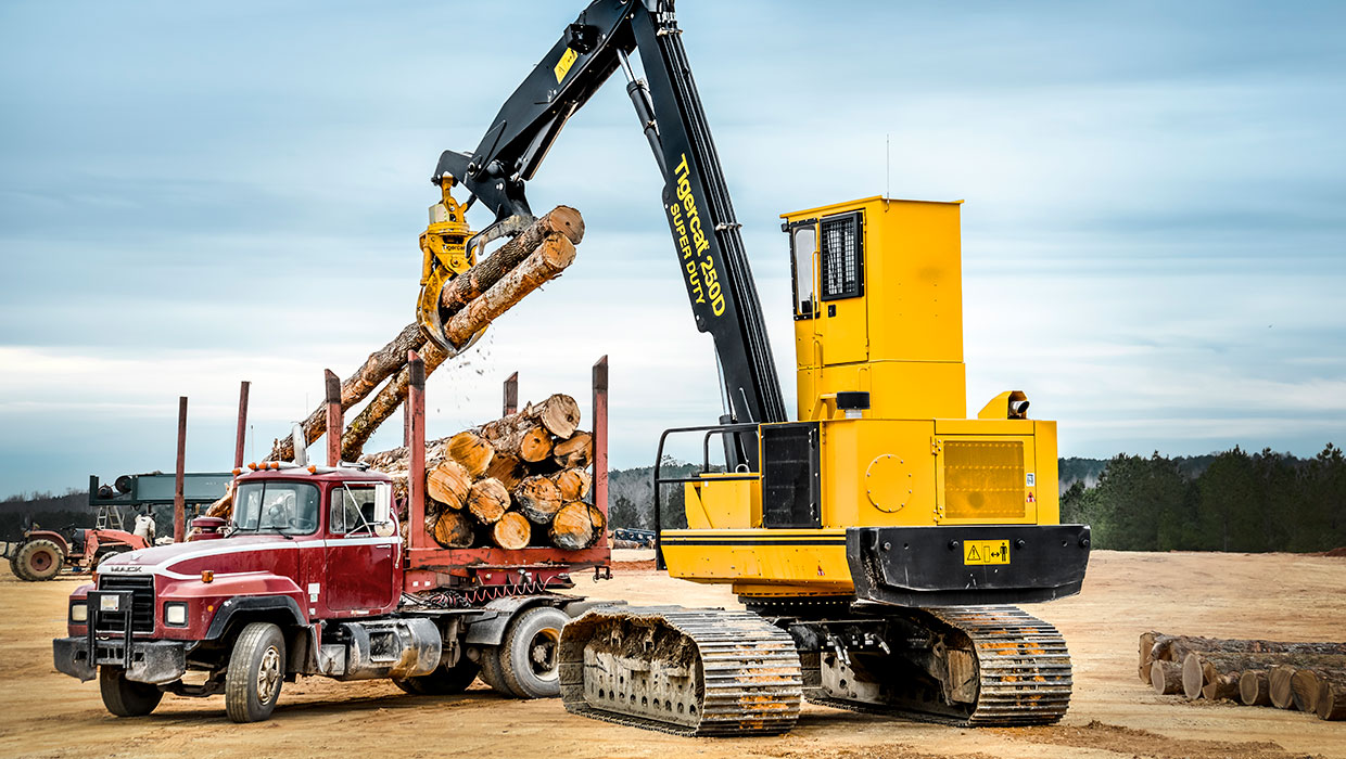 Image of a Mackolines Machines & Hire T250D loader working in the field