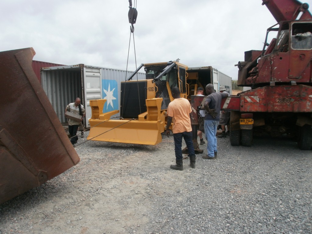 The 635D emerging from a shipping container.