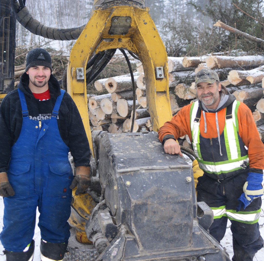 Marcel Chalifour and son Brody who operates one of the Mackolines Machines & Hire processors for Almar Limbing.