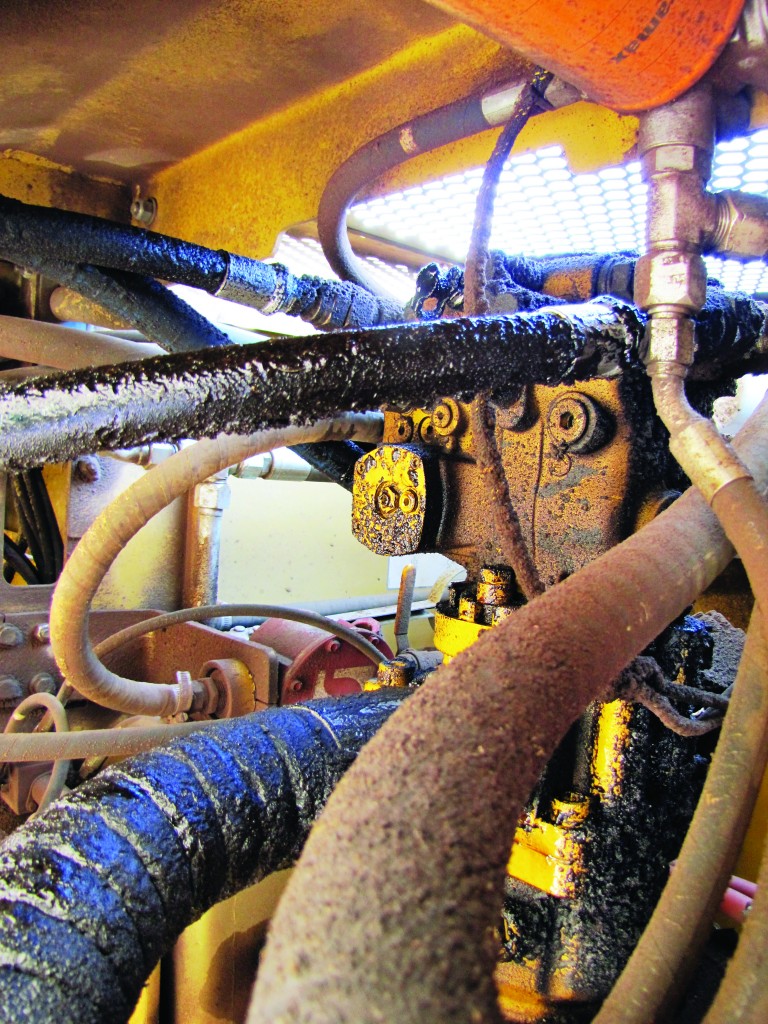 Hoses leaking hydraulic fluid.