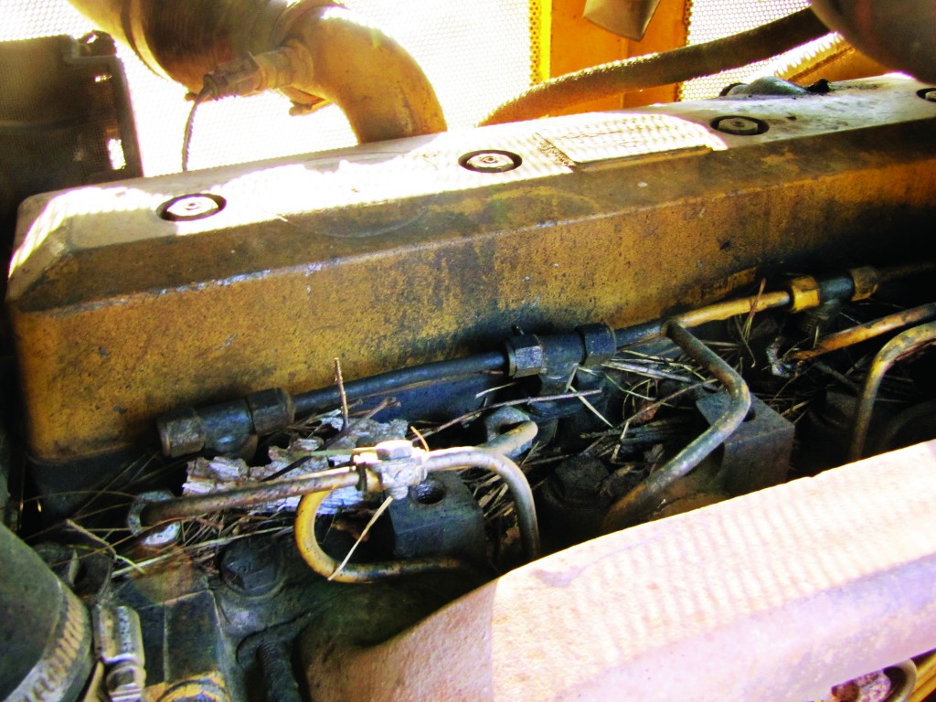 Debris near the engine manifold and turbo charger.