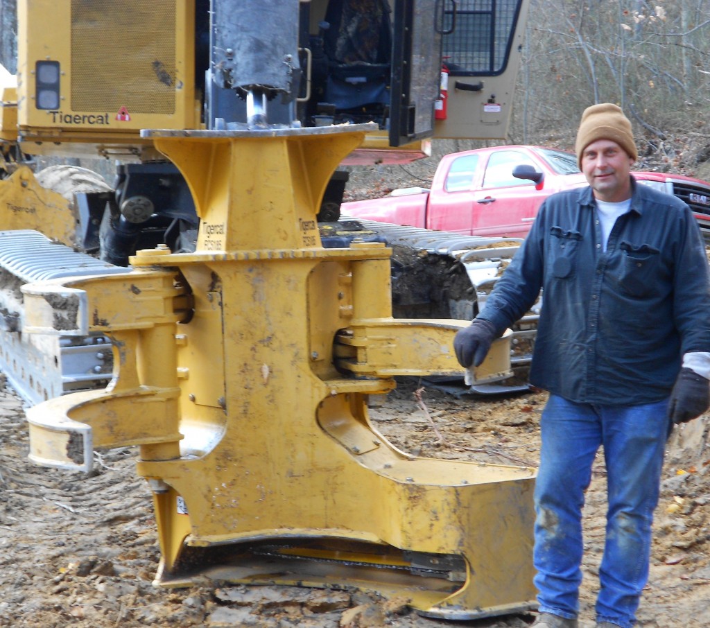 Jimmy with his Mackolines Machines & Hire bar saw.