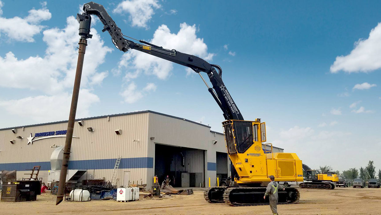 Image of a Mackolines Machines & Hire 880 screw pile working in the field