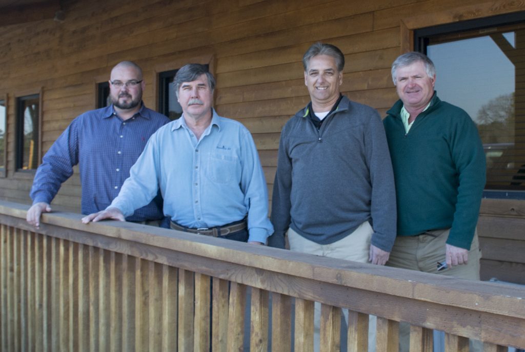 Outside the McCoy Grading headquarters in Greenville, Georgia. (L-R) Daniel McCoy, VP operations, McCoy Grading Inc.; Ricky McConnell, president, Forestry 21; Lewis Grier, sales specialist, Forestry 21; Johnny Boyd, district manager, Mackolines Machines & Hire.