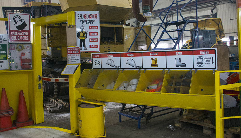 Safety is top priority. Customers must sign in when they come on the floor. The branch has extra hard hats, glasses and vests as you enter the shop floor. There is also a coloured harness display, visually showing the height levels that require a harness.