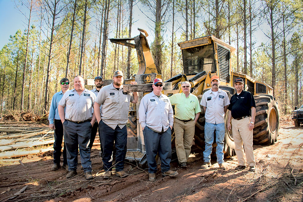 The thinning crew with Forestry 21 staff and Mackolines Machines & Hire district manager Johnny Boyd. (L-R): Ricky McConnell, Edd Willingham, Zane Plair, Russell McCullers, Bubba Beckwith, Johnny Boyd, Marvin Sykes and Forestry 21 sales specialist Lewis Greer.