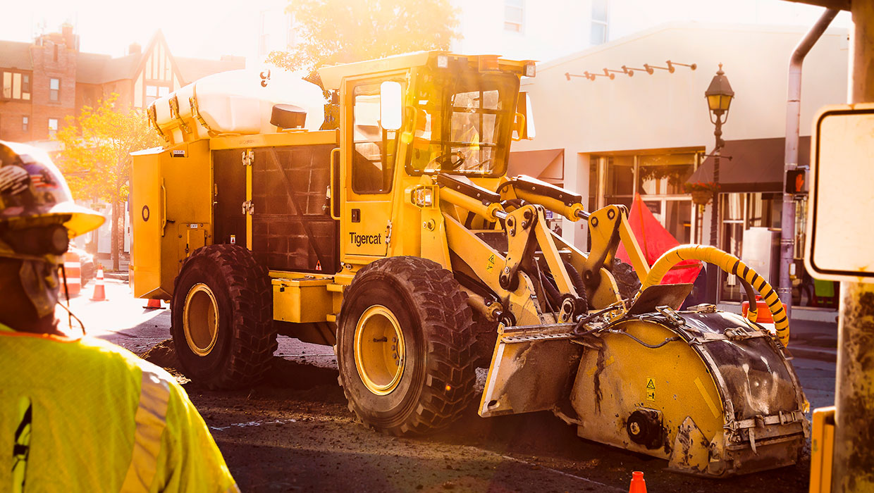 Image of a Mackolines Machines & Hire T726G street trencher working in the field