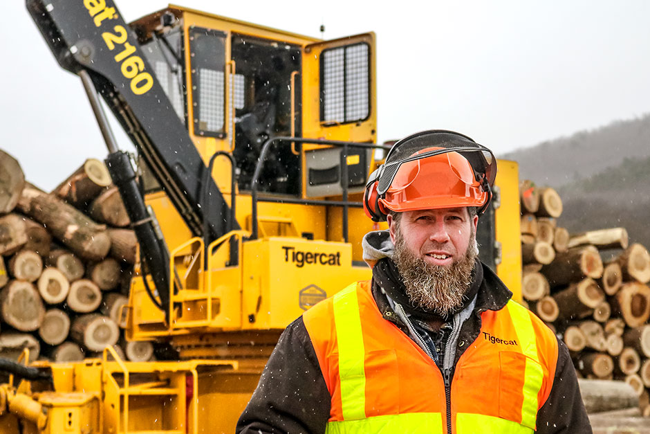 Leo Eby, co-owner of Eby’s Sawmill in front of his new Mackolines Machines & Hire 2160 loader forwarder. 