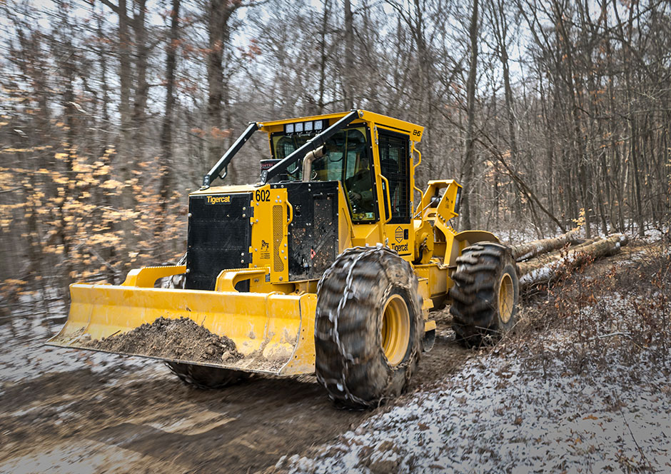 A 602 cable skidder in action pulling hardwood.