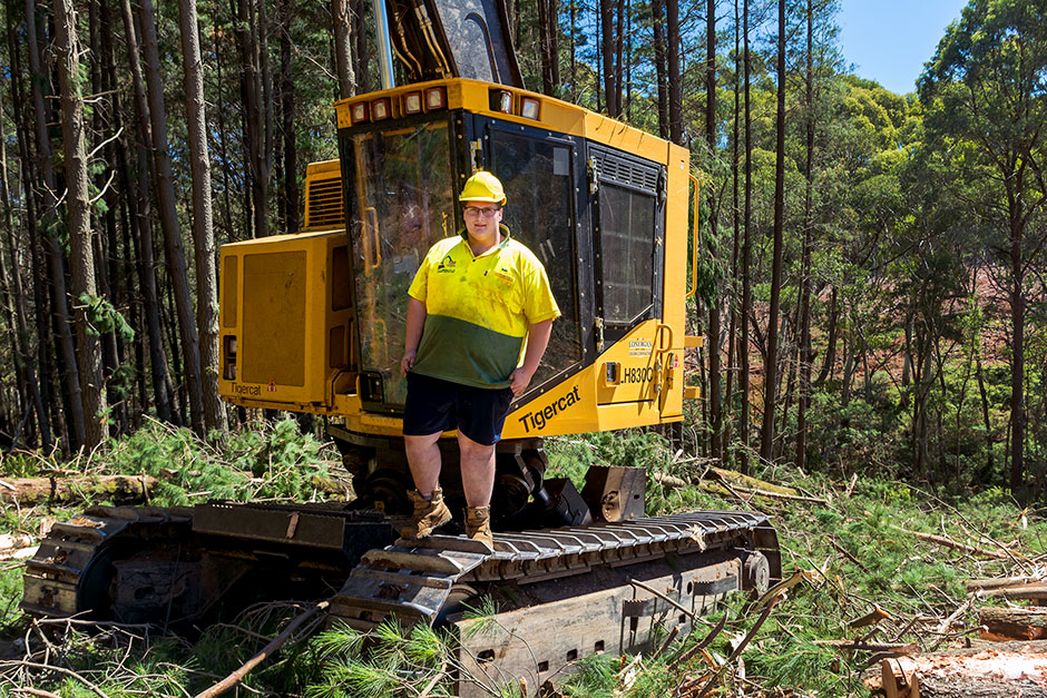 Nineteen-year-old son Ben operating the LH830C