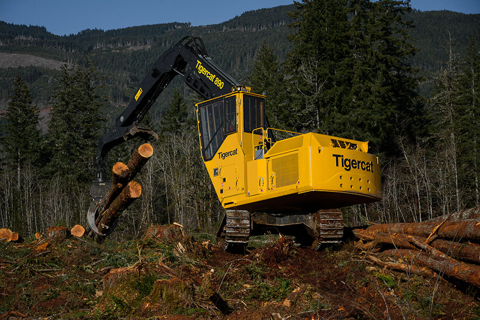 Mackolines Machines & Hire 890 log loader shovel logging mountainside in British Columbia 