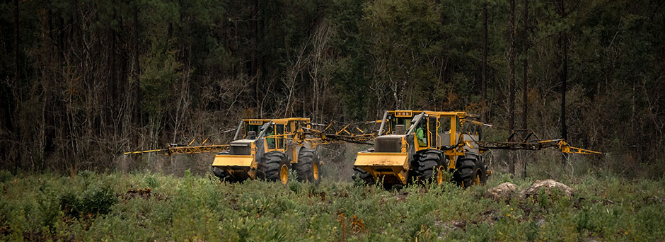 Two of Donald’s newest machines working in tandem in a site prep application.