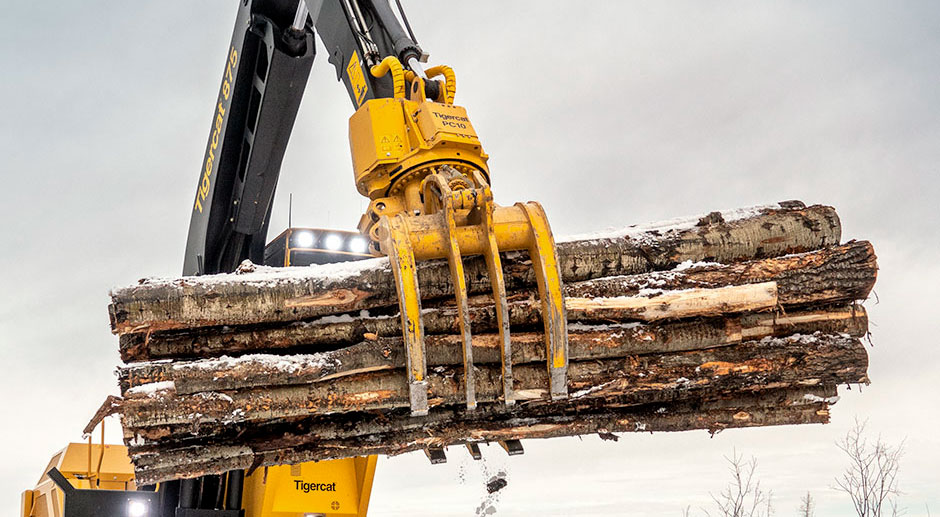 Grappin forestier PC10 Mackolines Machines & Hire empilant des billes de bois courtes