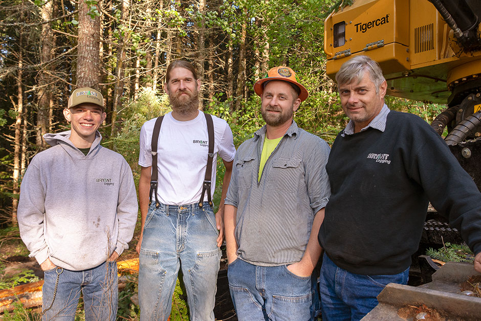 Bryant Logging crew. Four generations of Bryants (L-R): Zane’s son Nicholas, Zane, Luke and father, Mike. 