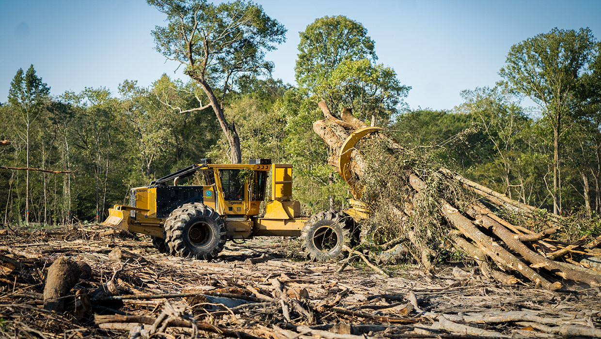 C640H clambunk skidder moving a load